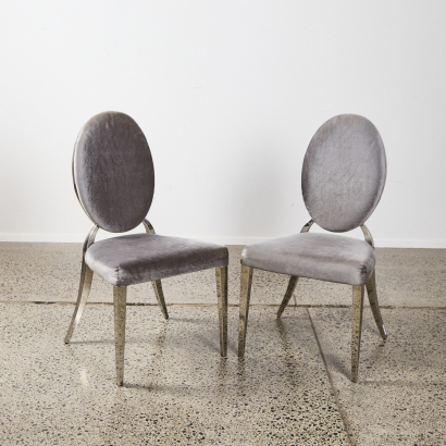 A Pair of Grey Shimmer Upholstered Hollywood Regency Chairs