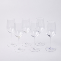 A Collection Of Six Riedel Wine Glasses