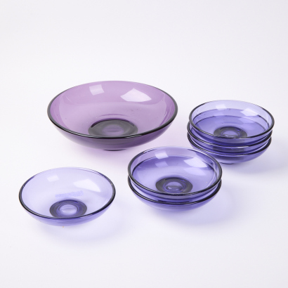 A Collection Of Vintage Purple Glass Dinnerware