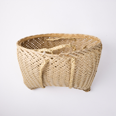 A Woven Basket, to be Worn as a Backpack