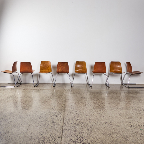 A Suit Of Eight Pagholz Chairs