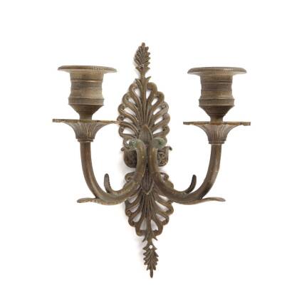 A Bronze Twin Branch Candle Wall Sconce