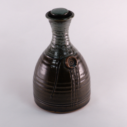 PETER STICHBURY stoppered bottle with decorative medallion