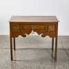 A Mahogany Three Drawer Occasional Table