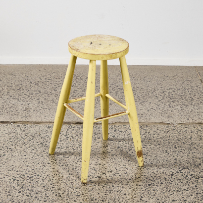 A Yellow Vintage Kitchen Stool