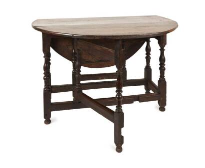 An Early 18th Century Oval Oak Gate Leg Table