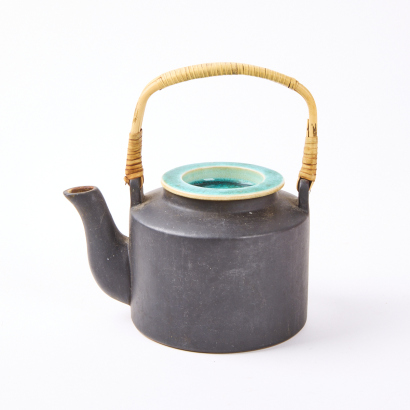 A Black Glazed Teapot with Cane Handle