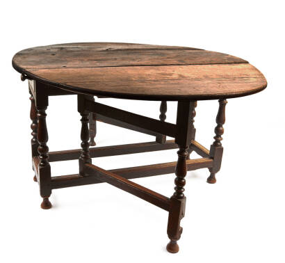 An Early-18th Century Oval Gate Leg Table