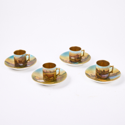 A Set of Four Miniature Countryside Cups & Saucers