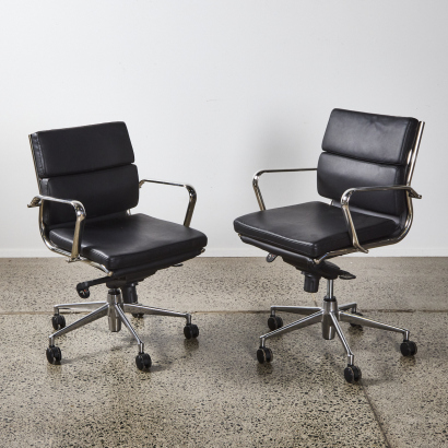 A Pair Of Vinyl and Chrome Chairs