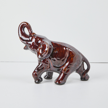 An Aquila Elephant in a Rockingham Type Glaze