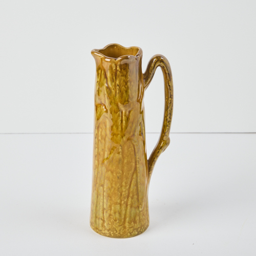 An Ambrico Crown Lynn Twig Handled Jug in Yellow