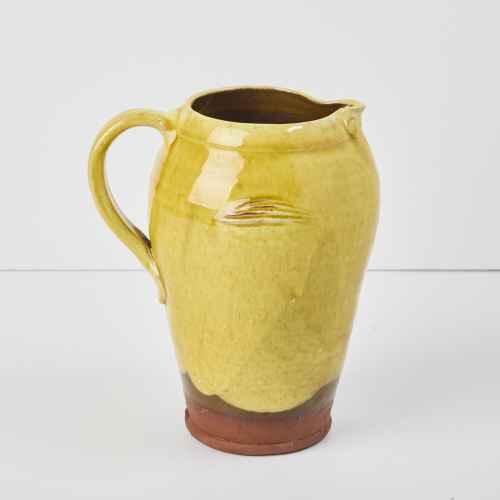 An Andrew van der Putten Avian Form Jug in Yellow