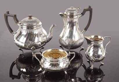 A Four Piece Sterling Silver Tea Service