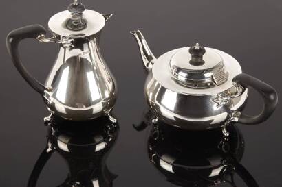 A Sterling Silver Teapot with Matching Coffee Pot