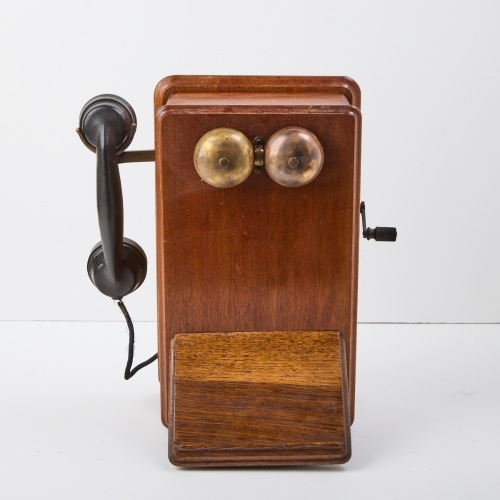 A Vintage Wall Mount Wooden Manual Phone