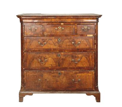 A Walnut Chest of Six Drawers