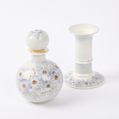 A Floral Cermic Candle Stick and Vessel