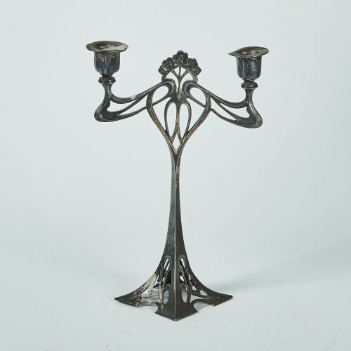 An Art Nouveau Pewter Candlestick Holder
