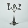 An Art Nouveau Pewter Candlestick Holder