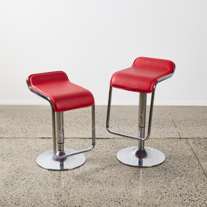 A Pair of Modern Adjustable Barstools with Red Upholstery