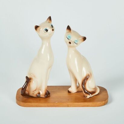 A Pair Of Retro Ceramic Siamese Cats On Wooden Mount