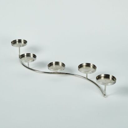 A Long Stainless Steel Table Candelabra