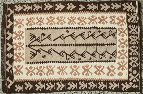A Handwoven Tribal Iranian Rug