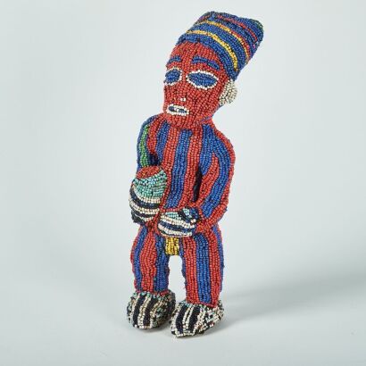 A Beaded Figurine Statue