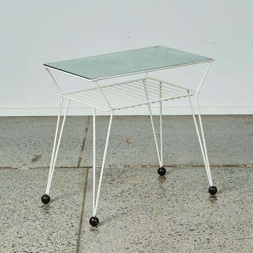 An Atomic Glass Topped Console Table