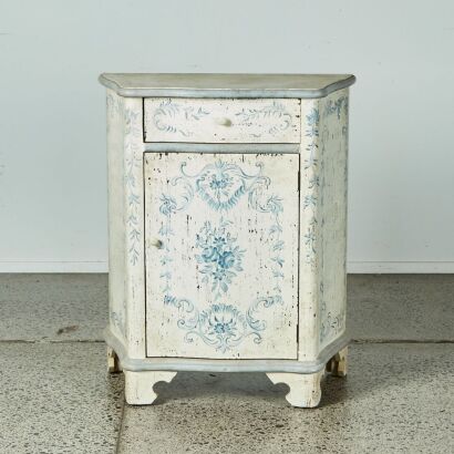 A Rustic Sidetable with Blue Decoration