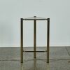 A Brass and Smoked Glass Corner Table