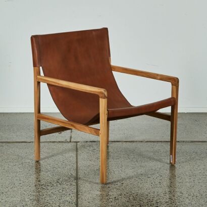 A Brown Leather Sling Chair with Teak Frame