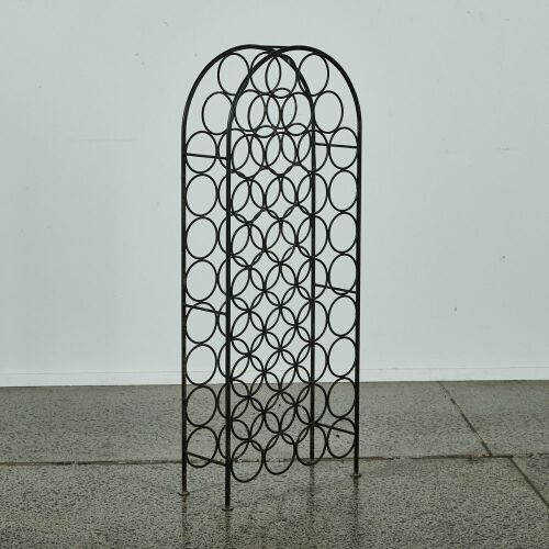 A Tall Arched Wine Rack Holds 38 Bottles