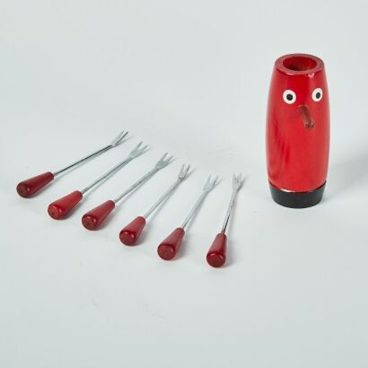 A Humorous Pickle fork Holder With 6 Forks