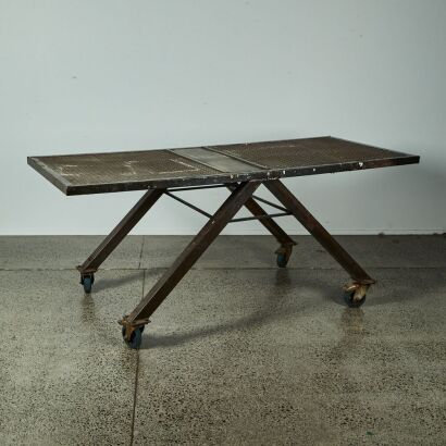 A Large Industrial Cast Iron Table