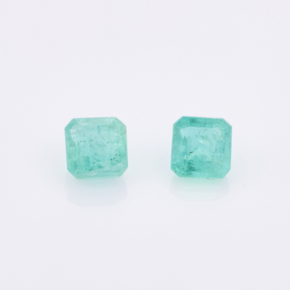 A Loose, 1.92ct Pair of Emerald Cut Emeralds