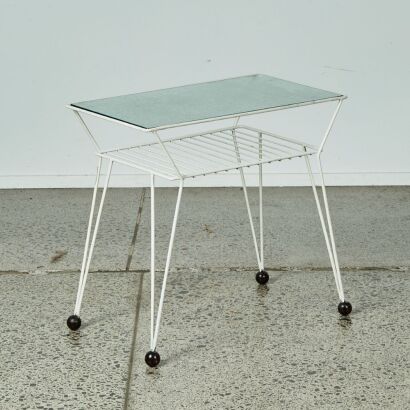 An Atomic Glass Topped Console Table