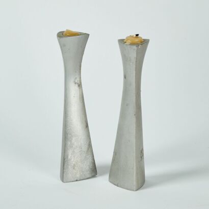 A Pair of Rondel Style Candlestick Holders