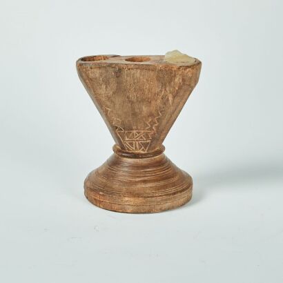 A Folk Art Candlestick Holder