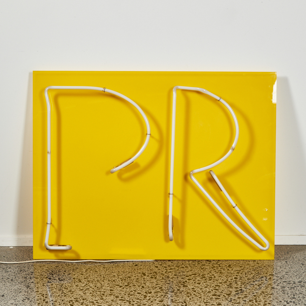 A Neon Sign Reading PR