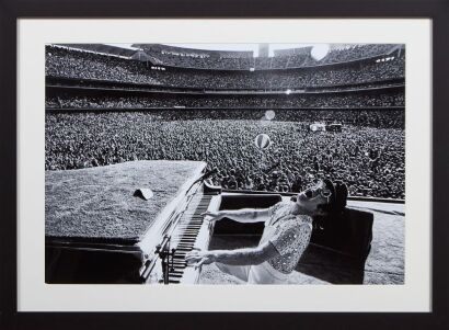 AFTER TERRY O'NEILL Elton John at Dodgers Stadium (1975)