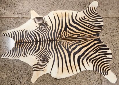 A Zebra Pattern Cow Hide Rug