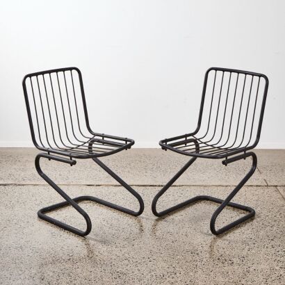 A Pair of Black Wire Chairs