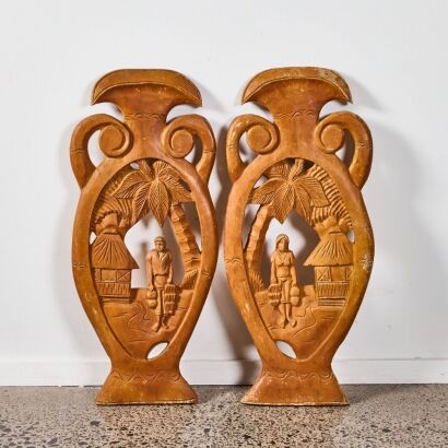 A Pair Of Hand Carved Indonesian Wall Hangings