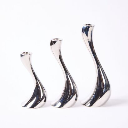 A Boxed Graduated Set of Three Georg Jensen Cobra Candlesticks by Constantin Wortmann