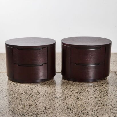 A Pair of Small Oval Bedside Tables