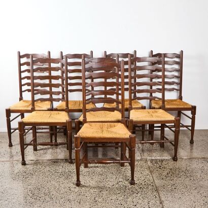 A Set of Eight Ladder Back Chairs