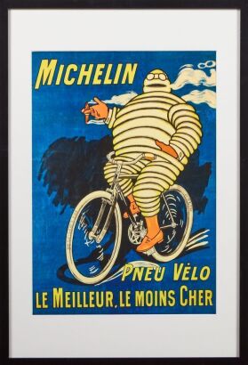 A Michelin Man Framed Poster