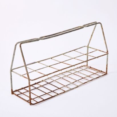 A Vintage Milk Bottle Rack